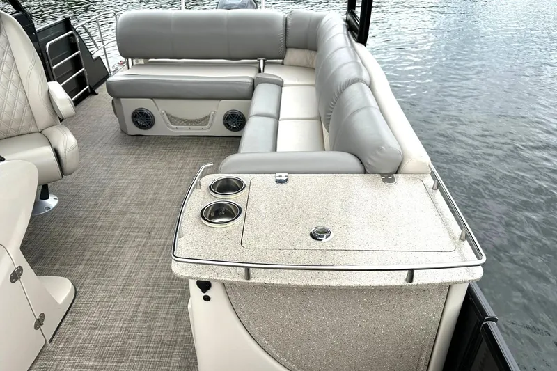 Slide: The Image of Luxurious seating on 2018 Harris Grand Mariner 250 pontoon boat with water view. - 25