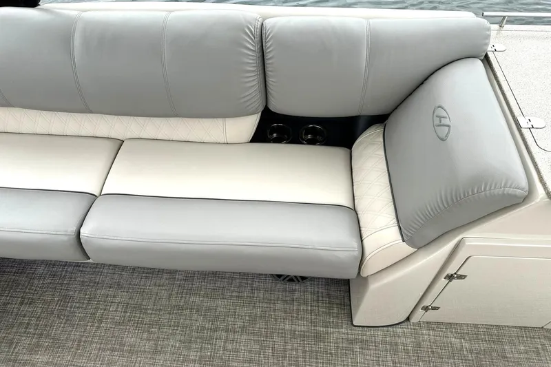 Slide: The Image of Luxurious seating on 2018 Harris Grand Mariner 250 boat, featuring elegant gray upholstery. - 29