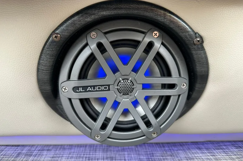 Slide: The Image of JL Audio speaker with blue LED lighting on 2018 Harris Grand Mariner 250 boat. - 48