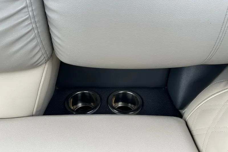 Slide: The Image of Cup holders in the 2018 Harris Grand Mariner 250 boat's luxurious seating area. - 54