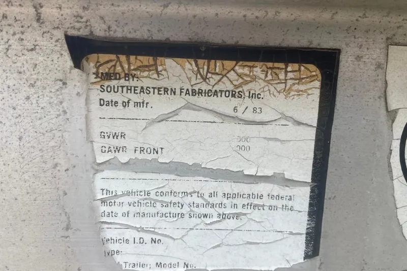 Slide: The Image of Aged manufacturing label on 1983 Sea Craft SF18 boat by Southeastern Fabricators. - 31