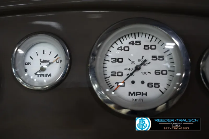 Slide: The Image of Close-up of 2005 Tahoe Q4 speedometer and trim gauge on dashboard. - 29