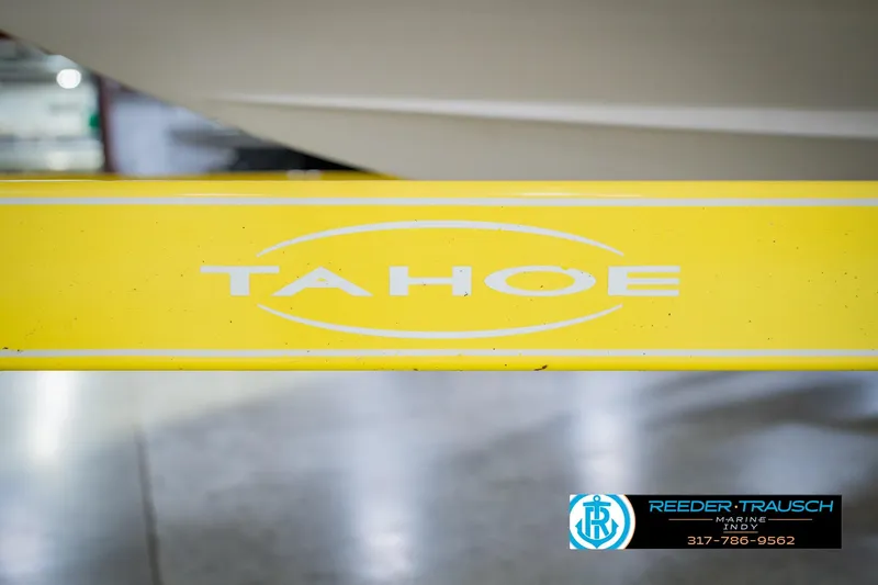 Slide: The Image of Yellow Tahoe Q4 2005 boat trailer with logo, Reeder Trausch Marine contact info visible. - 50