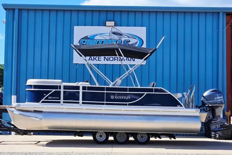 The Image of 2026 Godfrey XPERIENCE 2086 pontoon boat with Yamaha motor, displayed at dealership. - 0