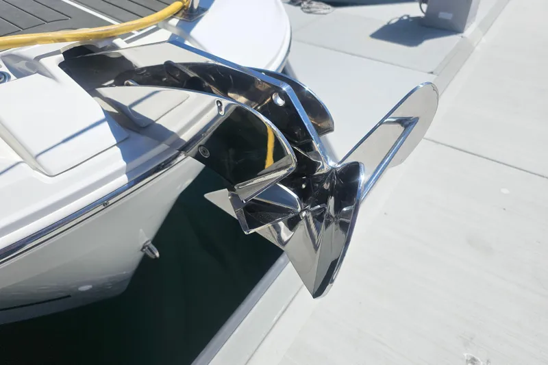Slide: The Image of Shiny anchor on Jeanneau NC Weekender 895 boat, docked at marina, 2021 model. - 10
