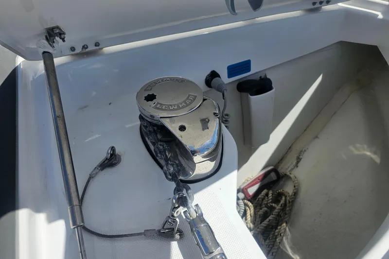 Slide: The Image of Anchor winch on 2021 Jeanneau NC Weekender 895 boat deck, featuring Lewmar equipment. - 11