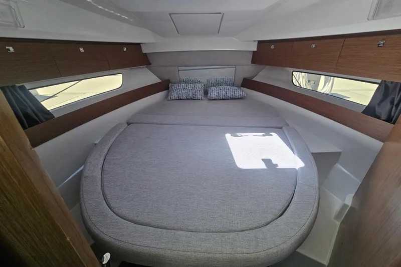 Slide: The Image of Interior cabin of 2021 Jeanneau NC Weekender 895 with cozy bed and modern design. - 26