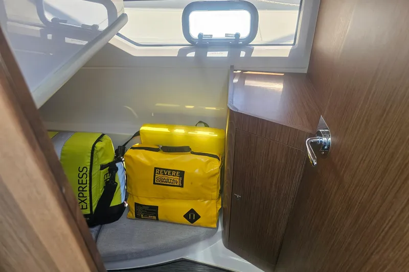 Slide: The Image of Interior cabin of 2021 Jeanneau NC Weekender 895 with safety equipment. - 28