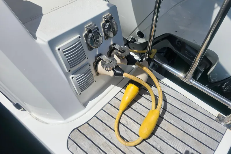 Slide: The Image of Electrical connections on a 2021 Jeanneau NC Weekender 895 boat deck. - 6