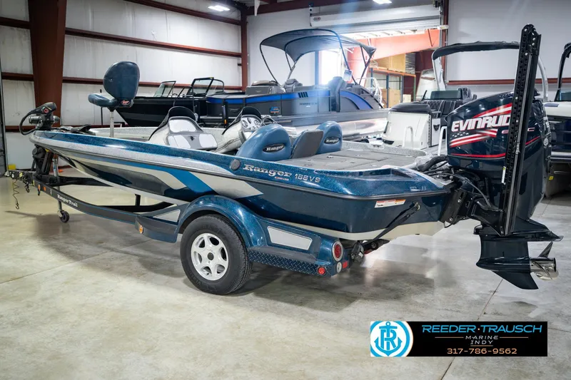 Slide: The Image of 2007 Ranger 188 VS boat with Evinrude engine in showroom setting. - 12