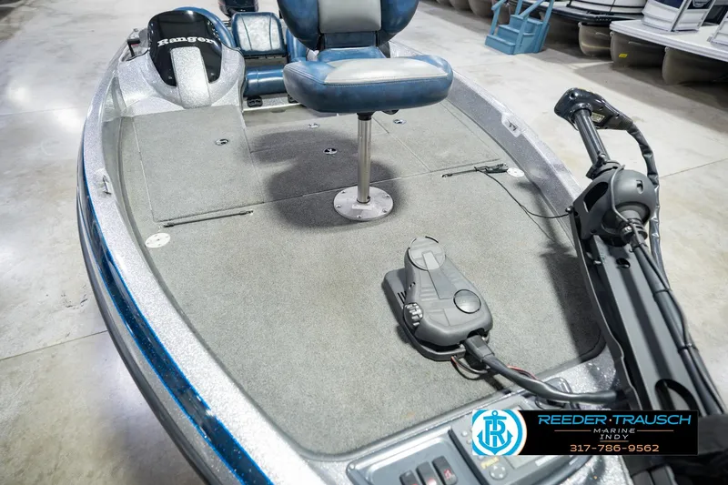 Slide: The Image of 2007 Ranger 188 VS boat interior with seating and control panel. - 15