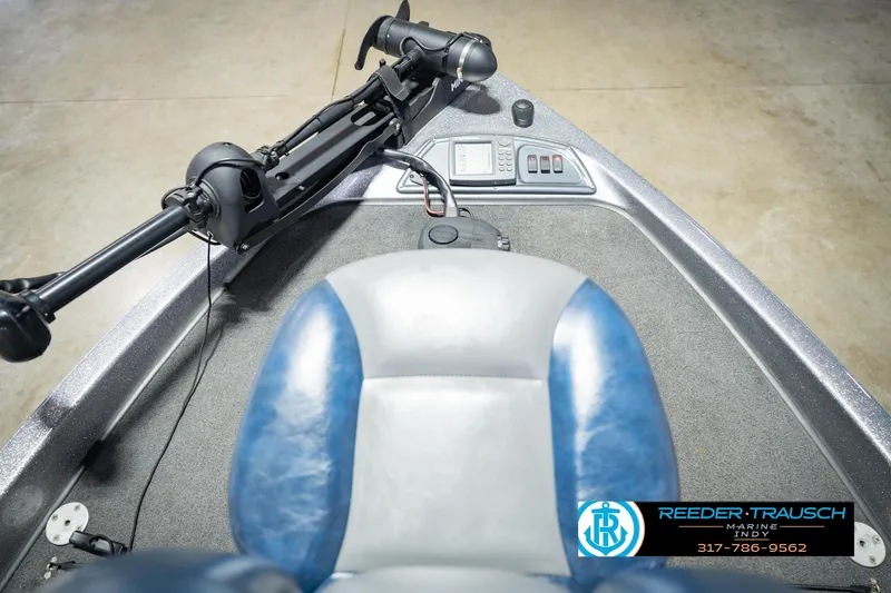 Slide: The Image of 2007 Ranger 188 VS boat interior with control panel and seating. - 20