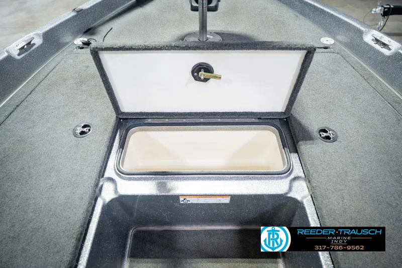 Slide: The Image of 2007 Ranger 188 VS boat storage compartment with open lid, showcasing interior space. - 27