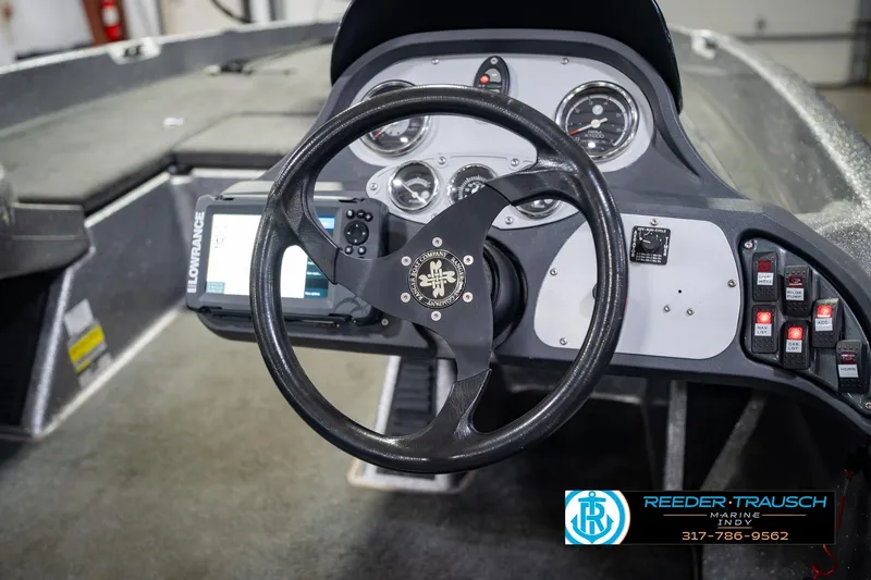 Slide: The Image of 2007 Ranger 188 VS boat dashboard with steering wheel and control panel. - 30