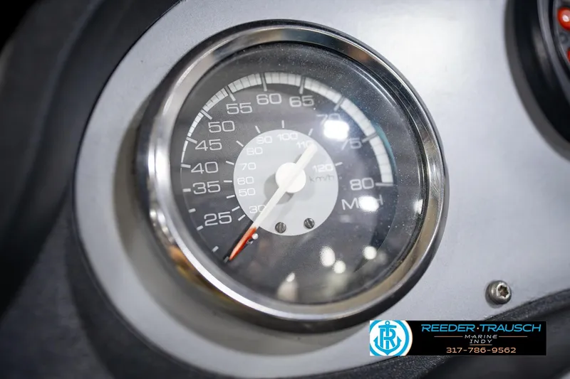 Slide: The Image of Close-up of a 2007 Ranger 188 VS speedometer, displaying speed in MPH and KM/H. - 34