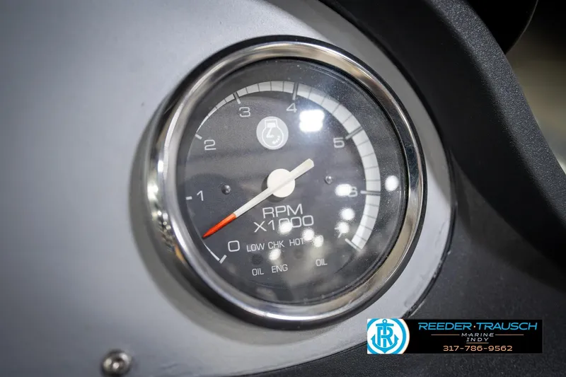 Slide: The Image of Close-up of a 2007 Ranger 188 VS tachometer displaying RPM levels. - 37