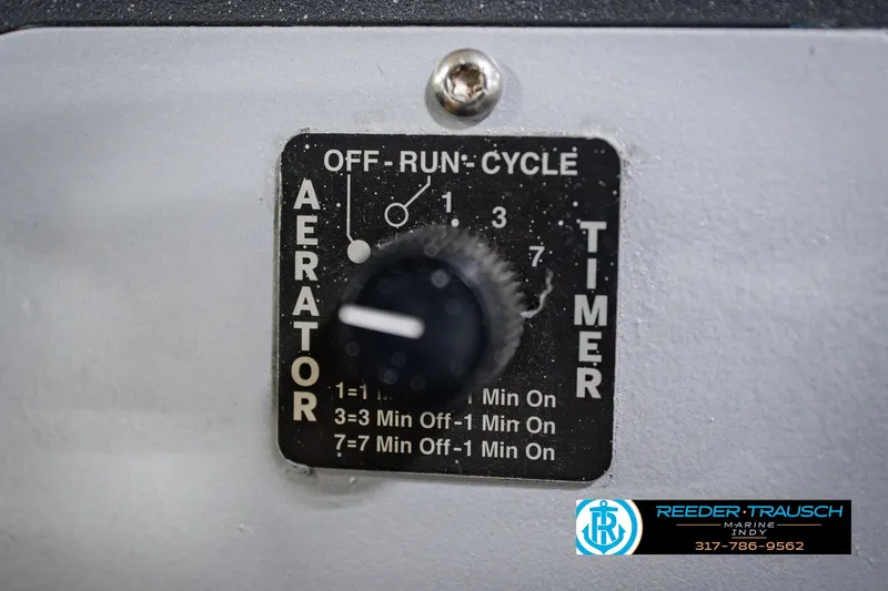 Slide: The Image of 2007 Ranger 188 VS aerator timer control panel with settings and Reeder Trausch Marine logo. - 38