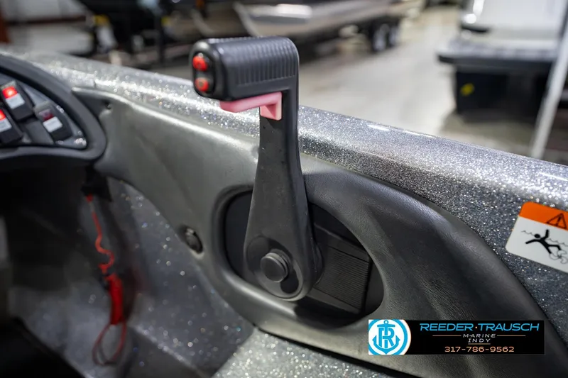Slide: The Image of Close-up of 2007 Ranger 188 VS boat throttle control in a showroom. - 41