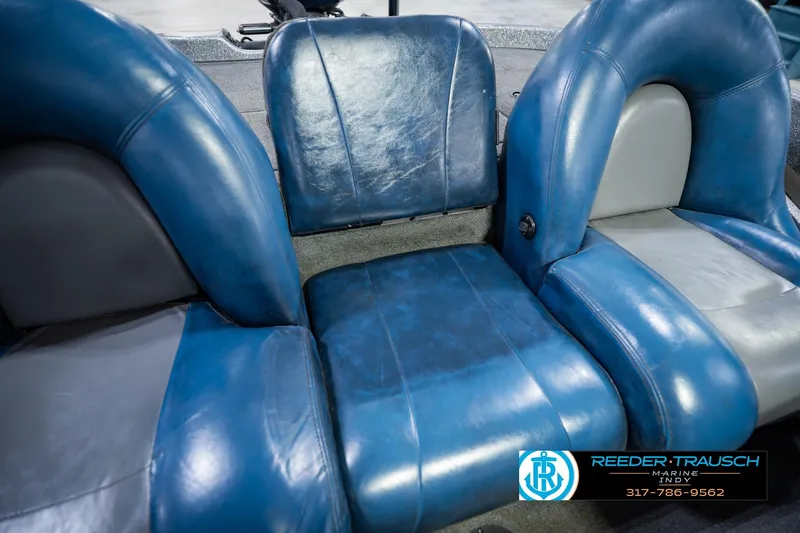 Slide: The Image of Blue leather seats in a 2007 Ranger 188 VS boat interior. - 44