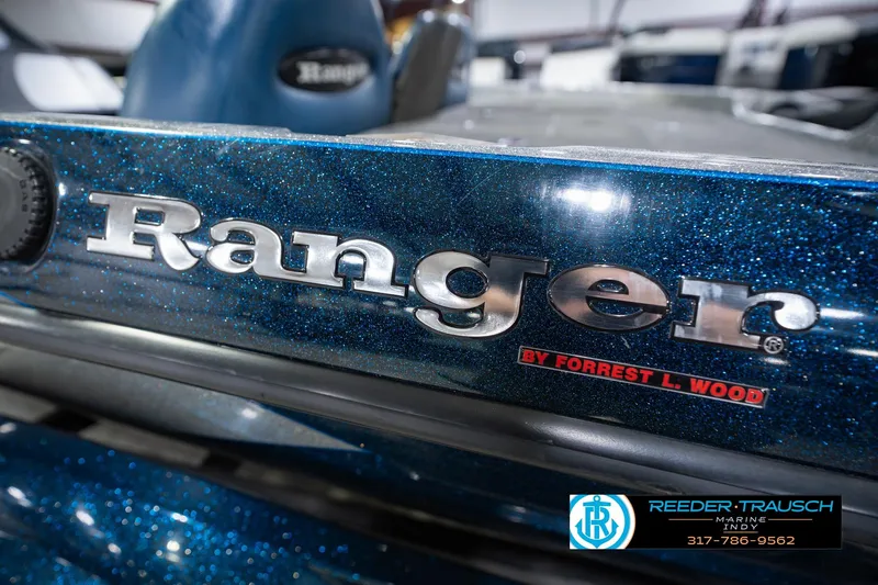 Slide: The Image of 2007 Ranger 188 VS boat with metallic blue finish and branding details. - 59