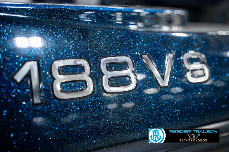 Slide: The Image of Close-up of metallic blue Ranger 188 VS boat emblem, 2007 model. - 60