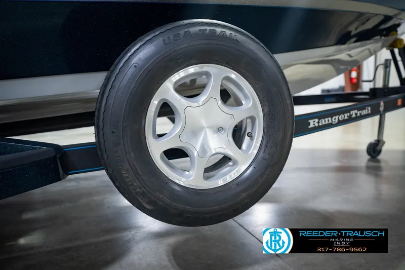 Slide: The Image of 2007 Ranger 188 VS boat trailer wheel with USA Trail tire. - 64