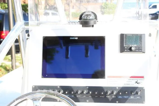 Slide: The Image of Dashboard of 2024 Pathfinder 2200 TRS with Simrad display. - 15