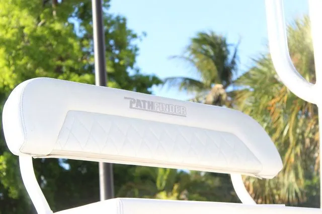 Slide: The Image of 2024 Pathfinder 2200 TRS boat seat with tropical background. - 25