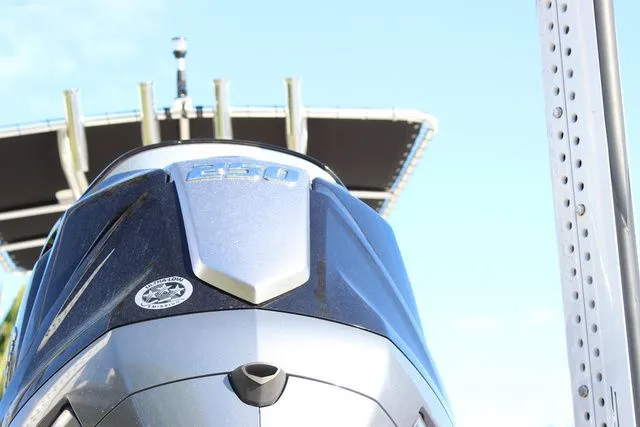 Slide: The Image of Close-up of a 2024 Pathfinder 2200 TRS boat with outboard motor. - 5