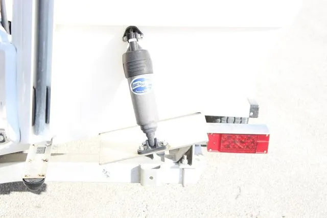 Slide: The Image of 2024 Pathfinder 2200 TRS boat trailer with shock absorber. - 6