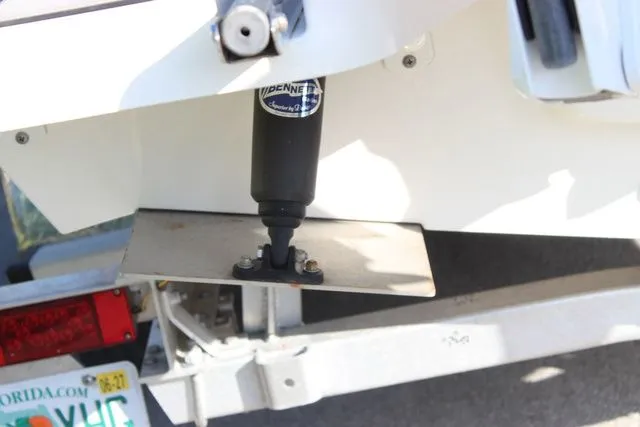 Slide: The Image of 2024 Pathfinder 2200 TRS boat with trim tab detail view. - 7