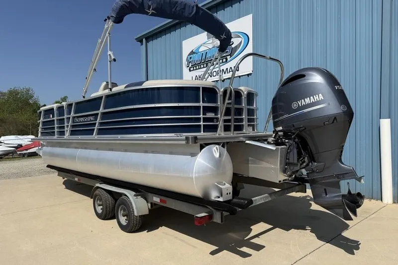 Slide: The Image of 2022 Berkshire 24RFX LE pontoon boat with Yamaha engine on trailer. - 23