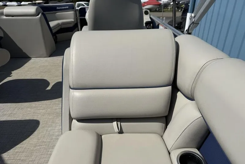 Slide: The Image of Luxurious seating on 2022 Berkshire 24RFX LE pontoon boat, featuring beige upholstery. - 34