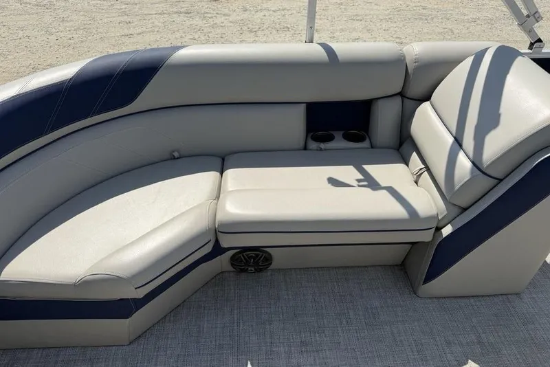 Slide: The Image of Dashboard of a 2022 Berkshire 24RFX LE pontoon boat with gauges and controls. - 8