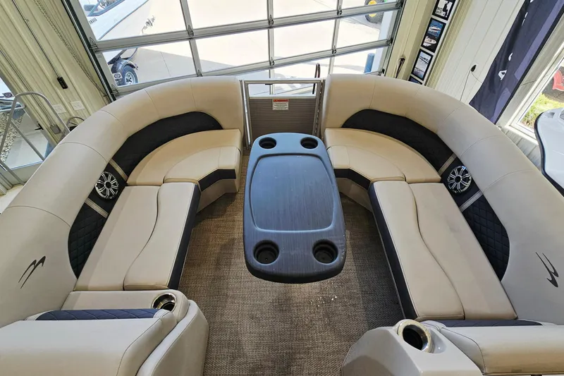 Slide: The Image of Luxurious interior of 2019 Bennington SX 22 Premium Stern Radius pontoon boat with plush seating. - 15