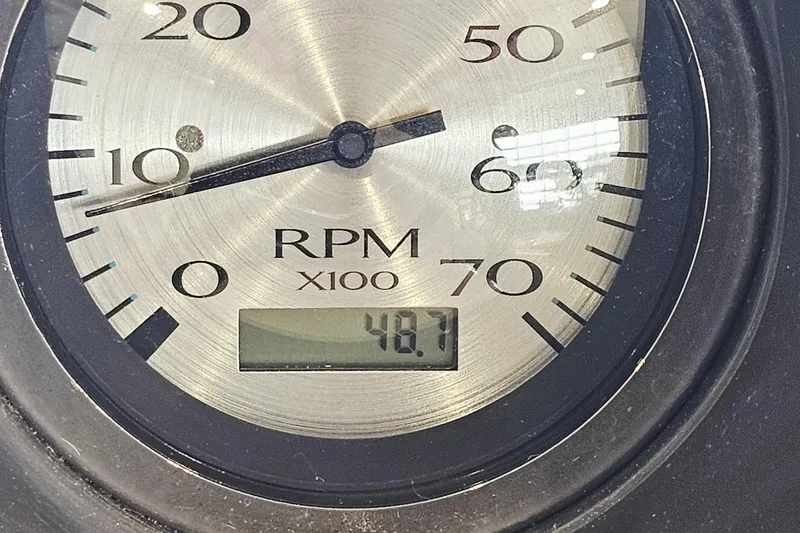 Slide: The Image of Close-up of a 2019 Bennington SX 22 Premium tachometer showing 487 RPM. - 17