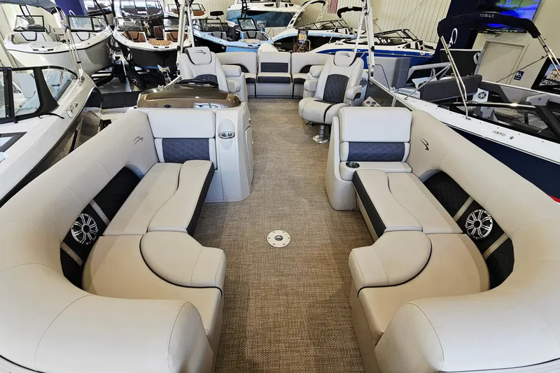 Slide: The Image of Luxurious interior of 2019 Bennington SX 22 Premium Stern Radius pontoon boat in showroom. - 6