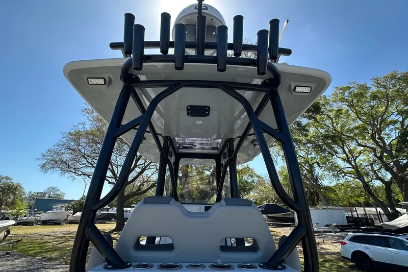 Slide: The Image of 2023 Latitude Tournament Boats LTB 25 interior with Simrad electronics, showcasing sleek design and functionality. - 12