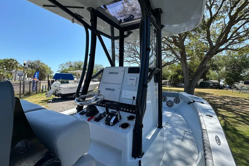 Slide: The Image of 2023 Latitude Tournament Boats LTB 25 dashboard with navigation and control systems. - 15