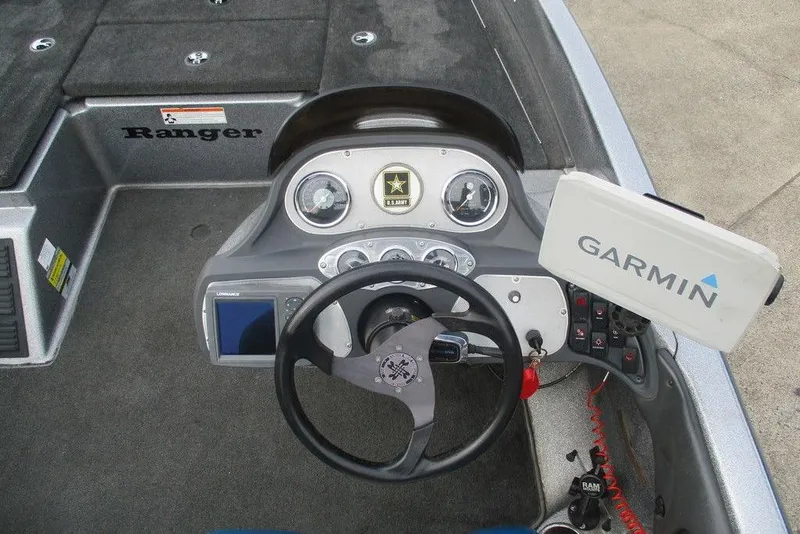 Slide: The Image of 2007 Ranger 188VS Intracoastal boat dashboard with Garmin GPS and steering wheel. - 3