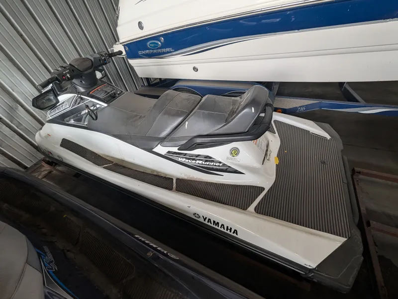 Slide: The Image of 2016 Yamaha VX1050A-RB jet ski in storage facility. - 2