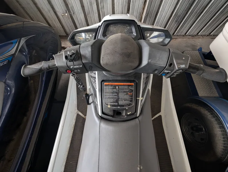 Slide: The Image of 2016 Yamaha VX1050A-RB jet ski cockpit view in a garage. - 7