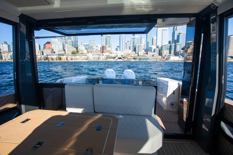 Slide: The Image of Interior view of 2026 Saxdor 400 GTC yacht with city skyline in background. - 26