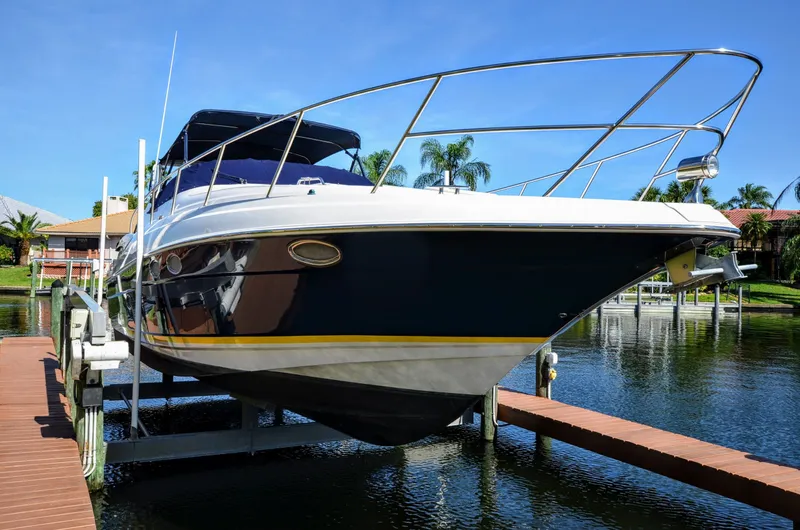 The Image of 2005 Regal 3560 Express Yacht on a dock. - 0
