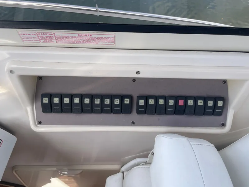 Slide: The Image of Control panel of a 2005 Regal 3560 Express boat. - 14