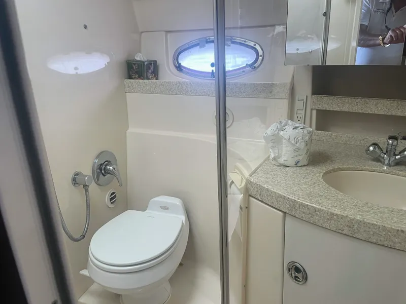 Slide: The Image of Bathroom in 2005 Regal 3560 Express boat. - 17