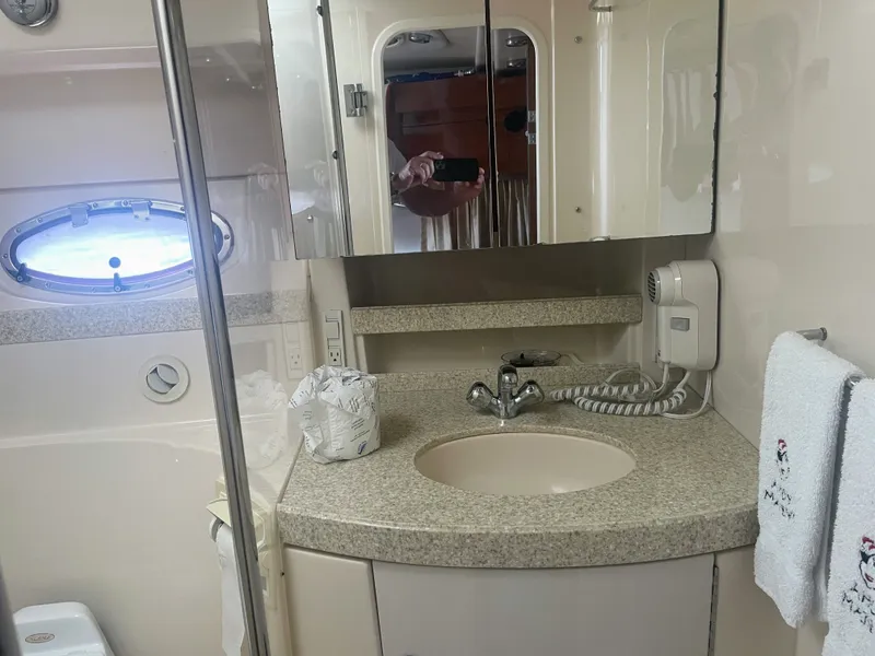 Slide: The Image of Bathroom in 2005 Regal 3560 Express boat. - 18
