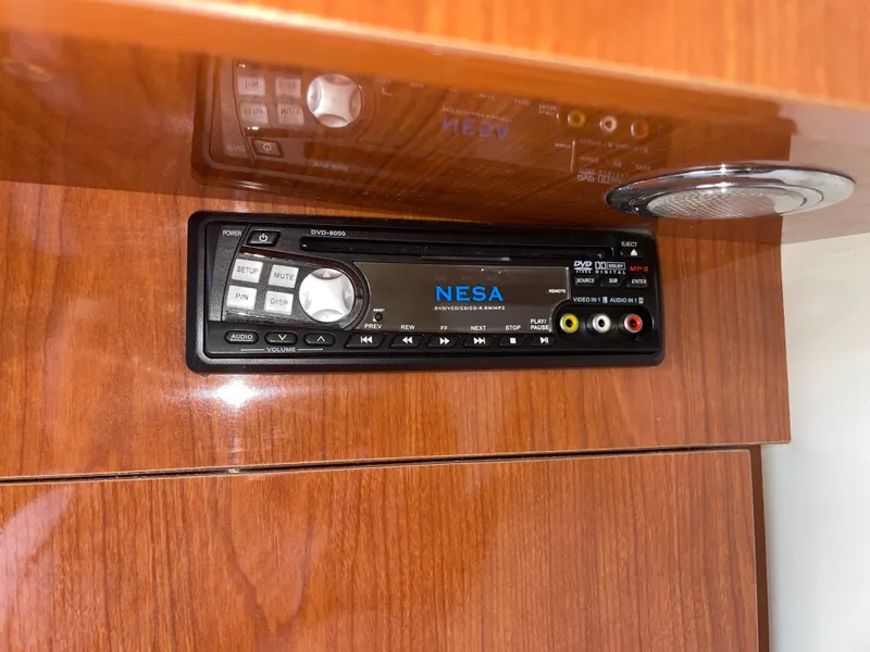 Slide: The Image of NESA DVD player in 2005 Regal 3560 Express boat. - 29