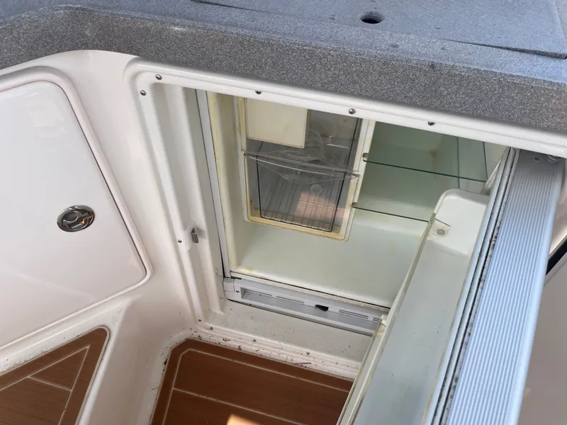 Slide: The Image of Open fridge on Regal 3560 Express boat, year 2005. - 38