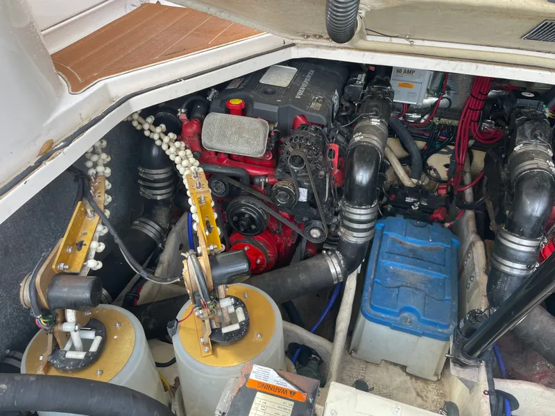 Slide: The Image of Engine compartment of a 2005 Regal 3560 Express boat with Volvo Penta engine. - 42